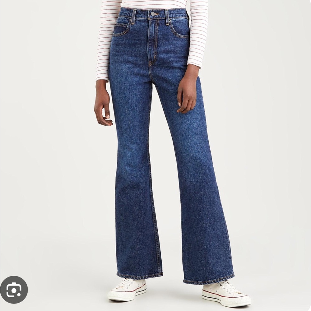 Levi’s 70s high rise flare dark blue jean in “sonoma step” wash size 28